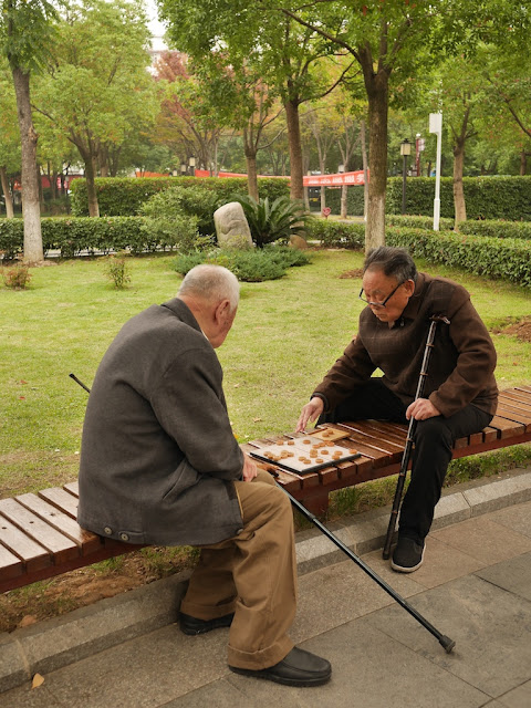 two men playing xiangqi