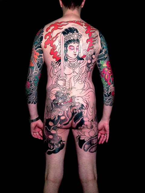 Monju Bosatsu with foo dog Japanese back piece tattoo by Diego Azaldegui