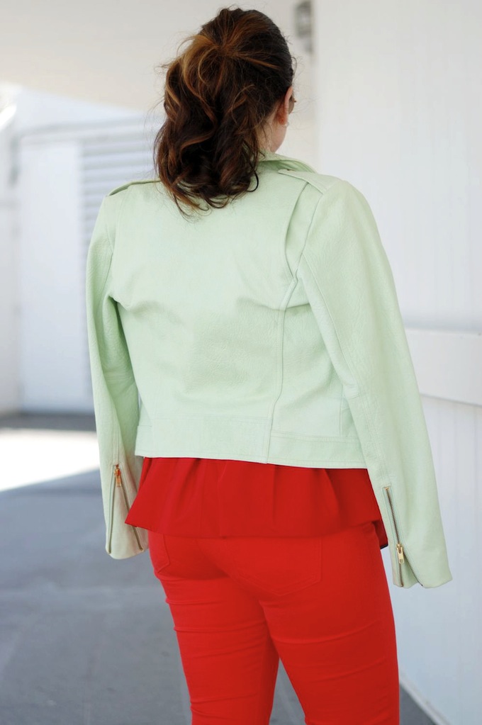 Cherry-hued Tibi peplum and Celine Nano heat up with a green leather Theory jacket