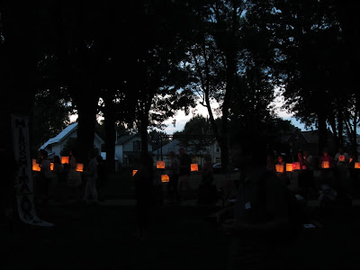 Hiroshima Day Kingston Peace Lantern Ceremony walking with lanterns at dusk