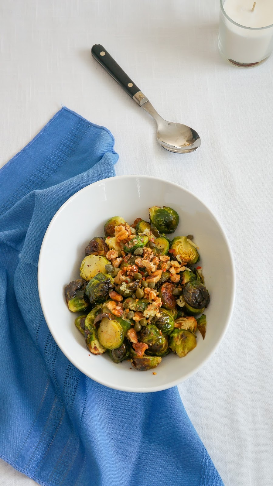 Roasted Brussels sprouts salad with toasted walnuts, capers and dill