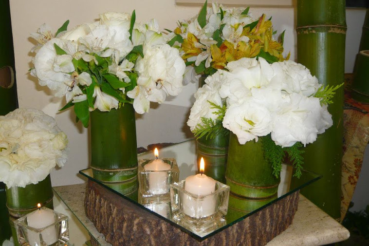 Casamento amostra para noivas centro de mesa com flores nobres.