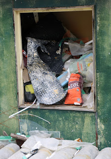 Lots of rubbish piled in the Green Building Lots of rubbish piled in the Green Building