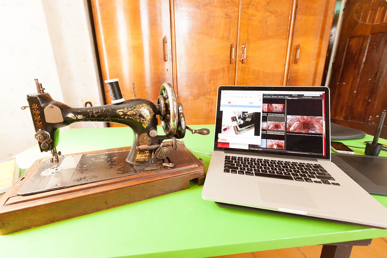 Technology exactly 110 years apart - grandma's Singer sewing machine, circa 1904, vs 2014 Mac Book Pro Retina Technology exactly 110 years apart - grandma's Singer sewing machine, circa 1904, vs 2014 Mac Book Pro Retina