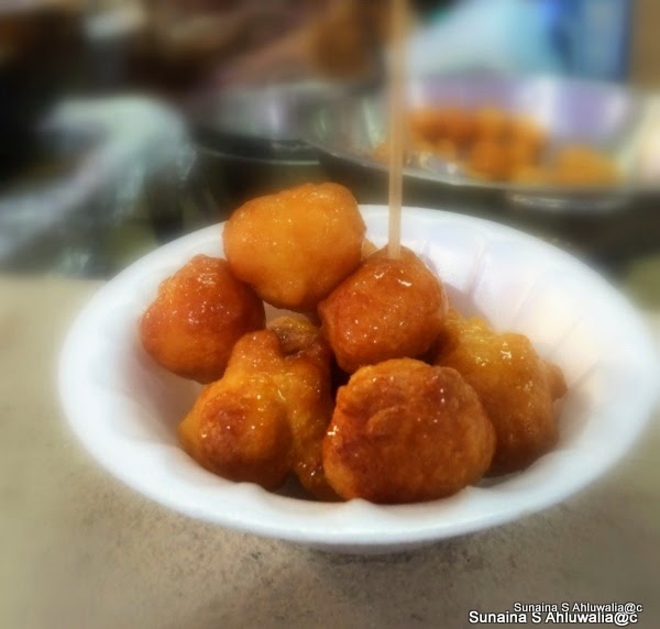 Food For Thought 'Luquaimat' and Tea. A traditional Omani sweet at