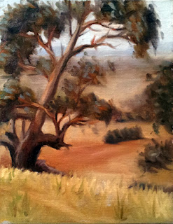 Oil painting of a gum tree on a hillside with dry grass and dusty distant paddocks.