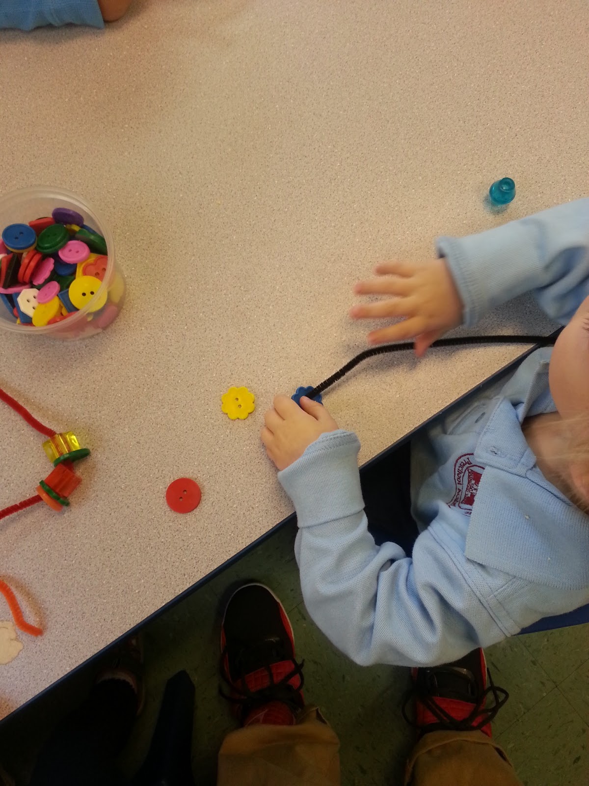 to the HH Toddler Classroom! Threading Beads, Stacking Cheerios on spaghetti noodles