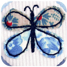 Blue butterfly badge