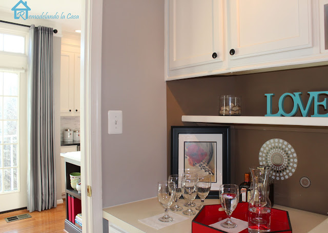 laundry room makeover with bar area and wine holder