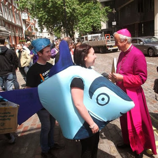 Vincent Nichols and a girl dressed as a shark