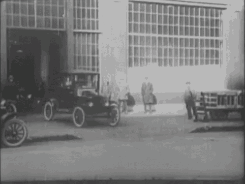 New cars coming off the assembly line. Ford Motor Co., c1915 ~