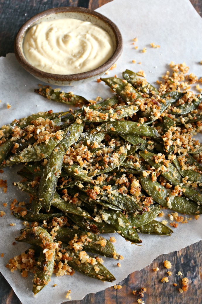 Crispy, oven roasted sugar snap peas with olive oil, cheese and seasoning.