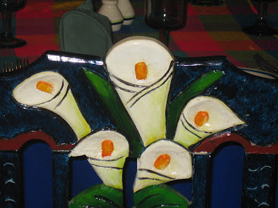 Picture of white lillies in traditional mexican picture