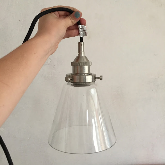 feature glass shade lighting with edison bulbs