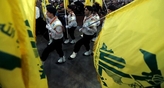 Image Attribute:  The file photo of Hezbollah's Mahdi Scouts participate in a parade in Beirut's southern suburbs as part of Quds Day on July 25, 2014. Al-Akhbar /Haitham Moussawi / CC-BY-NC-ND-3.0