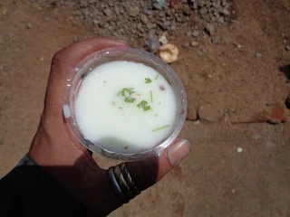 The Loapers Team Photo: A group photo of the participants standing at a scenic viewpoint on the hill.