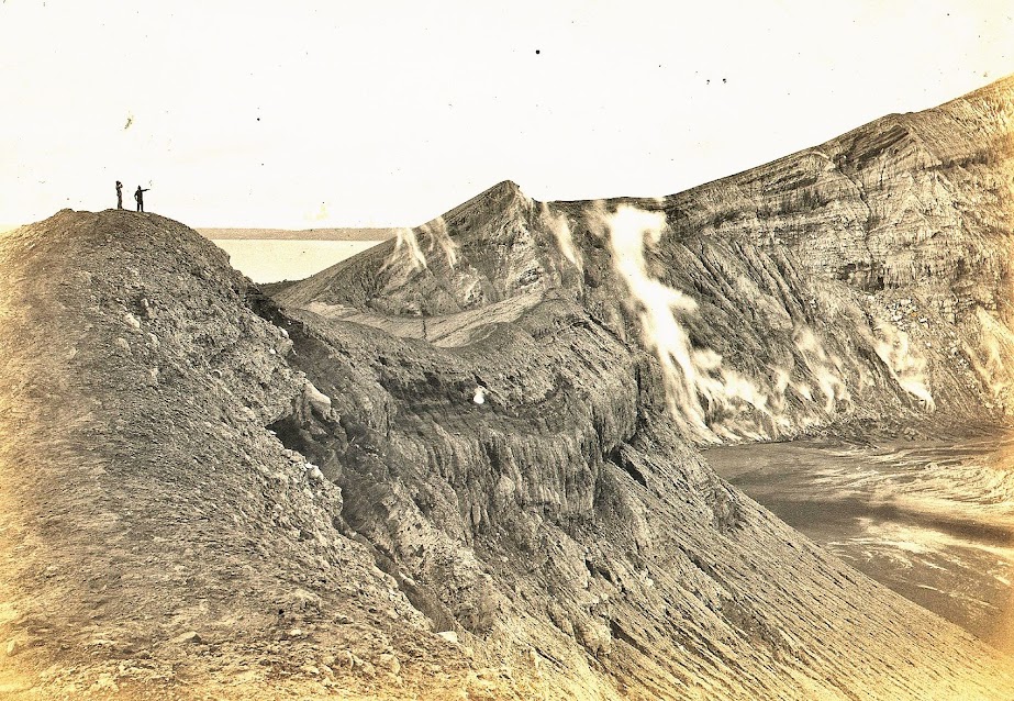 The Southeastern rim of the crater, showing Lake Taal and a corner of the floor of the crater. The smoke rising from the rocks comes from the sulphur jets. Image credit: University of Michigan Digital Collections. The Southeastern rim of the crater, showing Lake Taal and a corner of the floor of the crater. The smoke rising from the rocks comes from the sulphur jets. Image credit: University of Michigan Digital Collections.