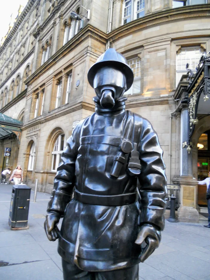 Things to do in Glasgow City: sculpture wearing a gas mask in Glasgow Scotland