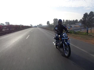 The group enjoying breakfast at their regular spot on the highway