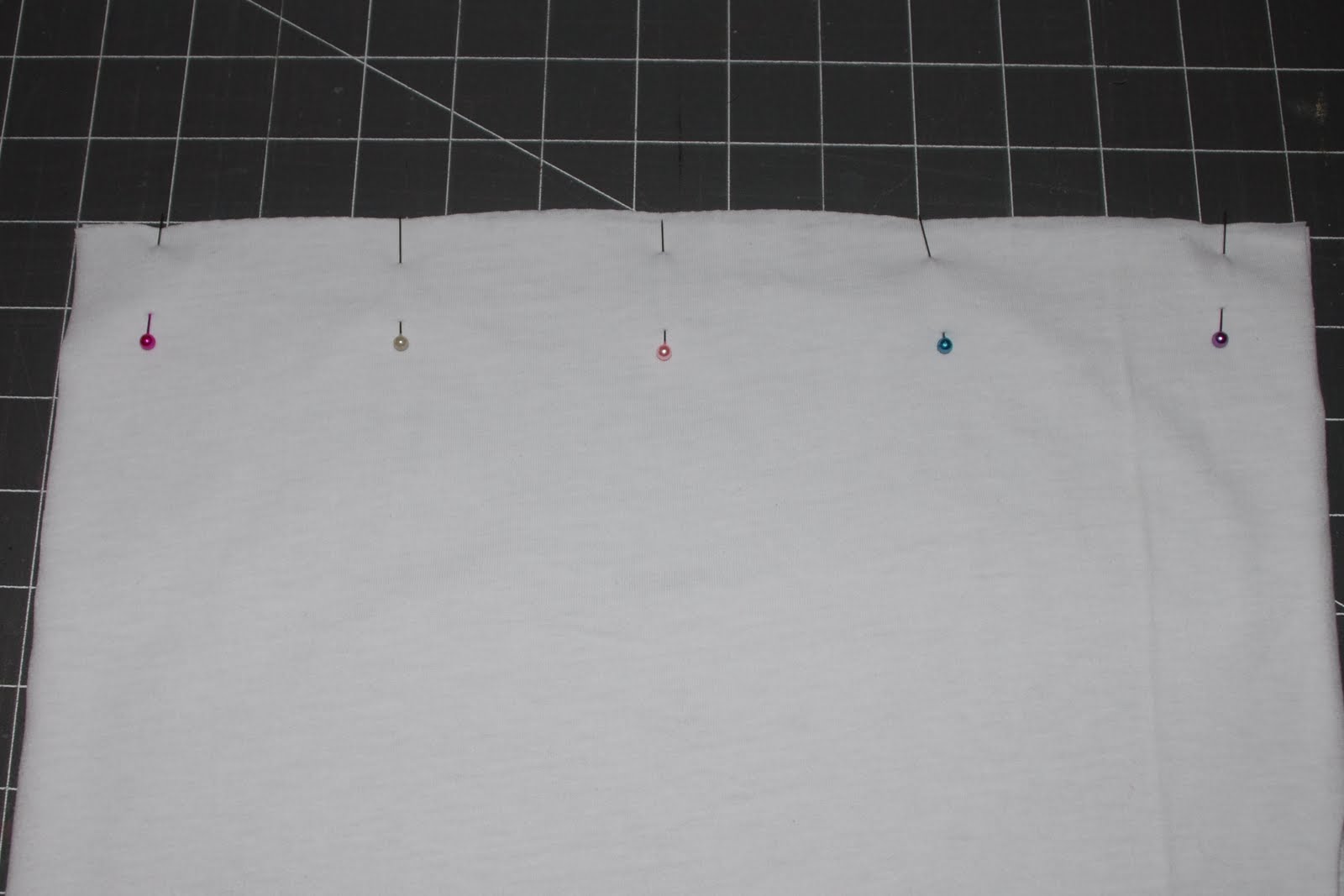 SO I cut a piece of leftover white jersey knit, then stitched the