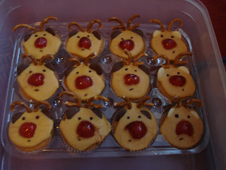 Cupcakes iced and decorated to look like Rudolph the red nosed Reindeer 