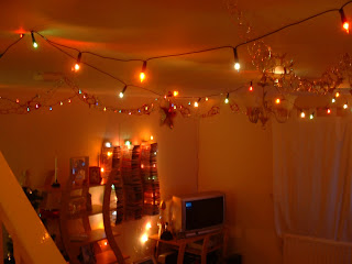 Christmas lights in the living room with the light off