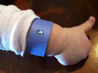 toddler wearing a blue bracelet to remember to God' commands in this toddler devotion about obeying God