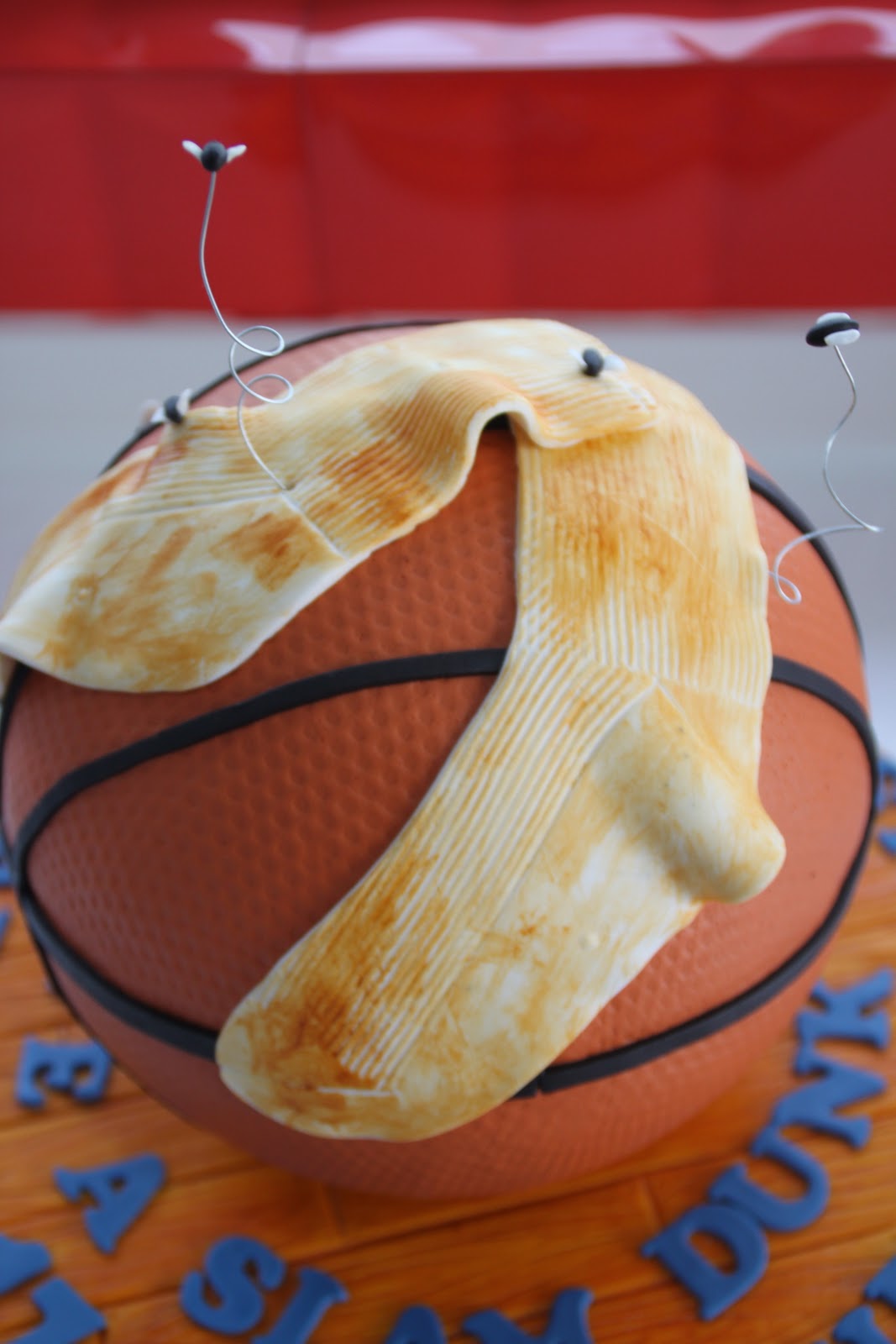Sculpted Basketball Cake With Socks 