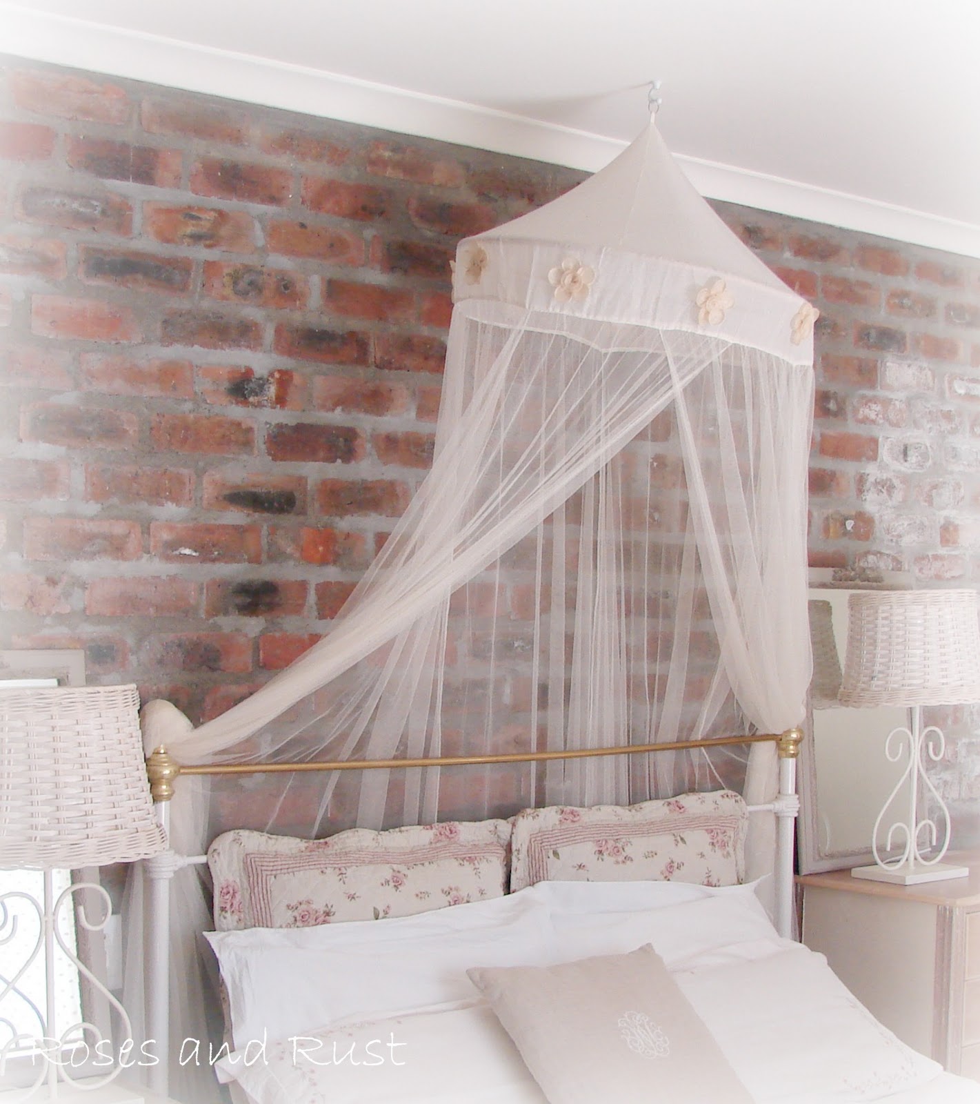 Roses and Rust: Exposed brick in the bedroom