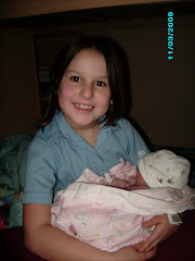 Z holding Illy for the first time