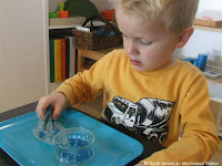 NAMC montessori preschool practical life activities follow the child working with tweezers