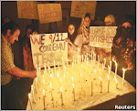 MULTAN - Sept 11: Students of a college light candles to mark the 7th anniversary of the 9/11 attac