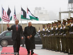 Palestinian President Mahmoud Abbas holds a welcoming ceremony for Bush on Thursday.
