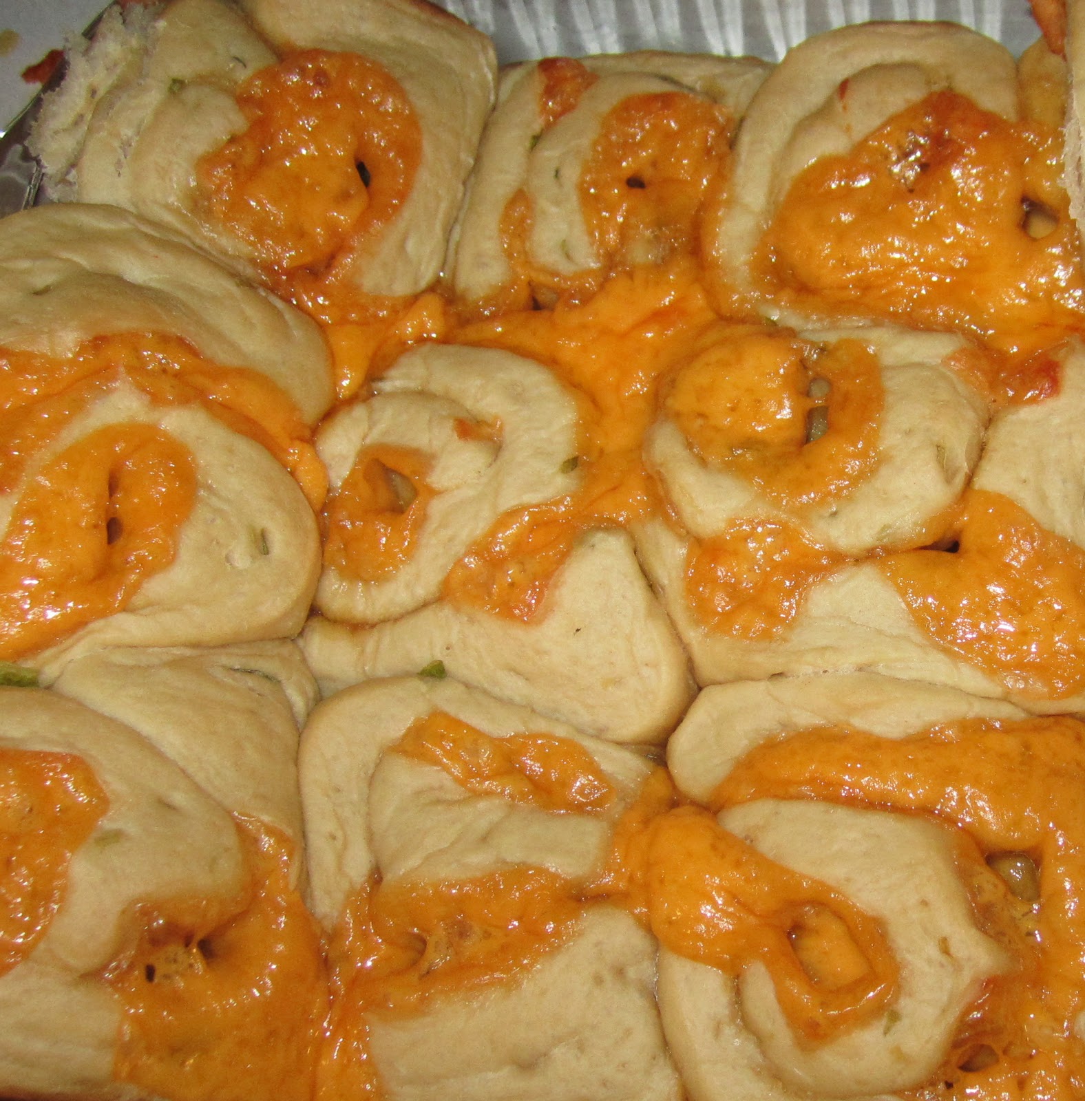 Stir it! Scrape it! Mix it! Bake it! Soft cheese and onion buns