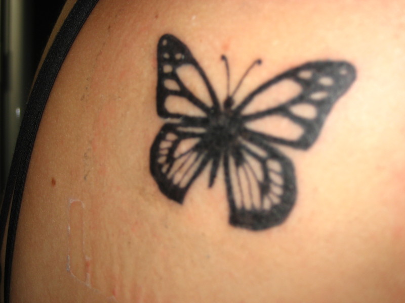 Lower Back Tattoo Butterfly. lower back butterfly tattoo.