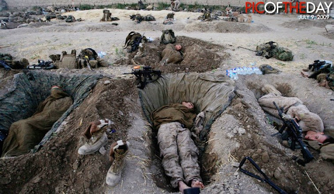 US Marines sleep inside their compound in the Nawa district