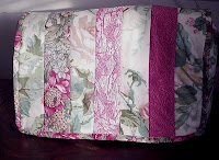 Quilted sewing machine cover using jelly roll strips