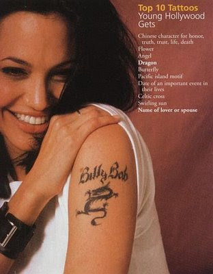 Angelina Jolie Tattoo Wanted Movie Poster with Gun on CheckOutMyInk.com