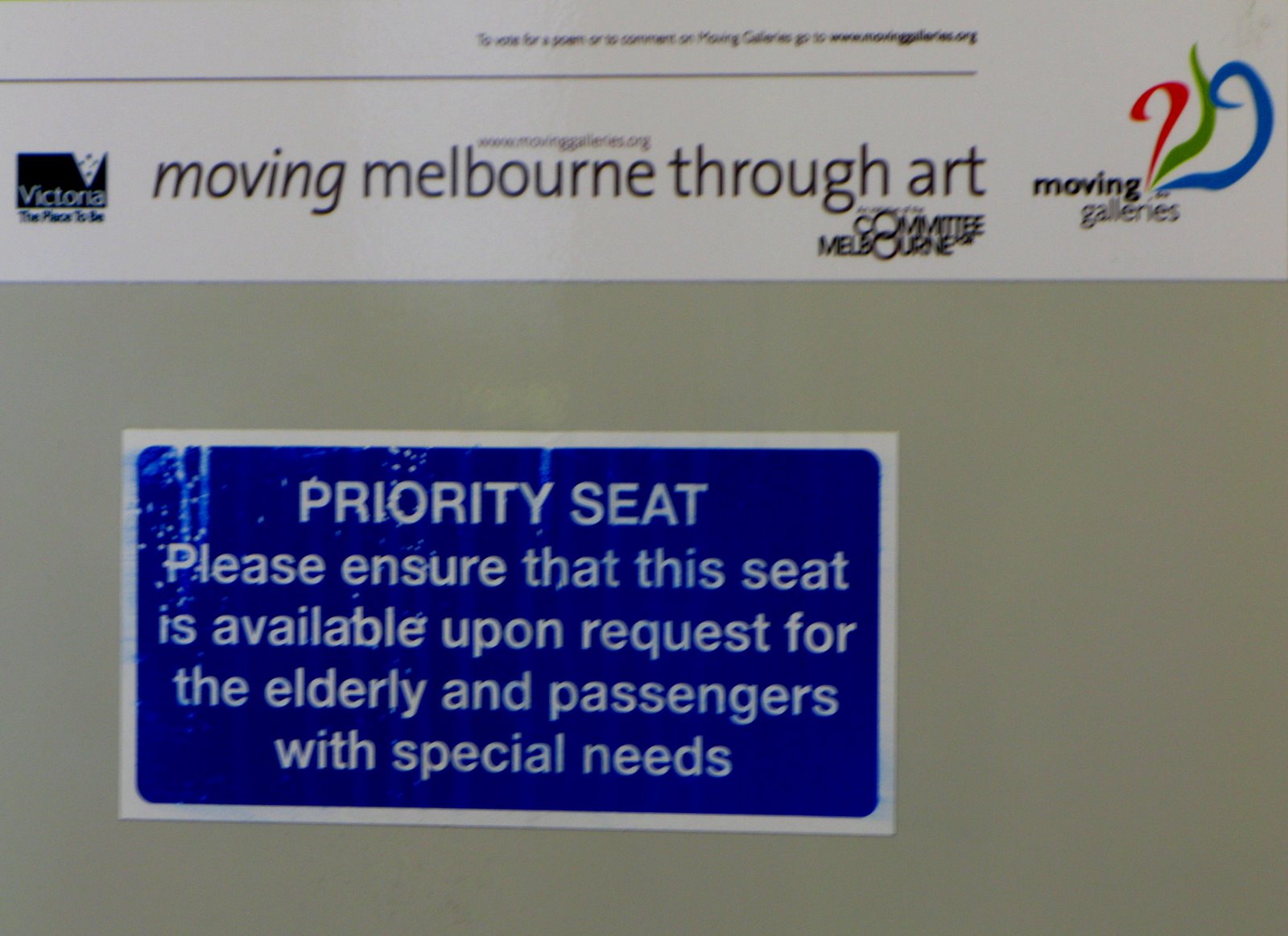 [Oldy+seating+sign+in+train.jpg]