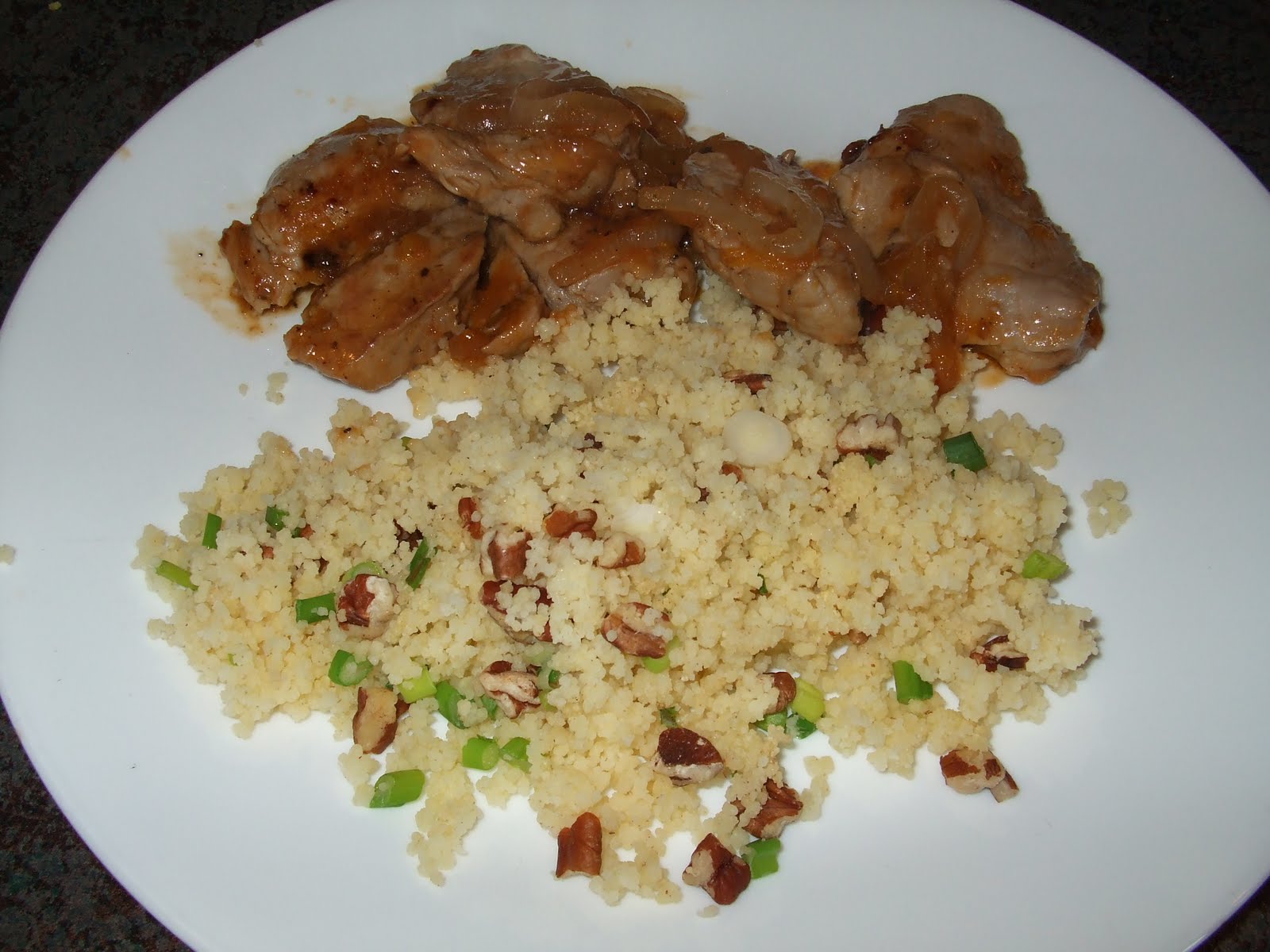 Dans les casseroles de GG Couscous au porc et à l'orange