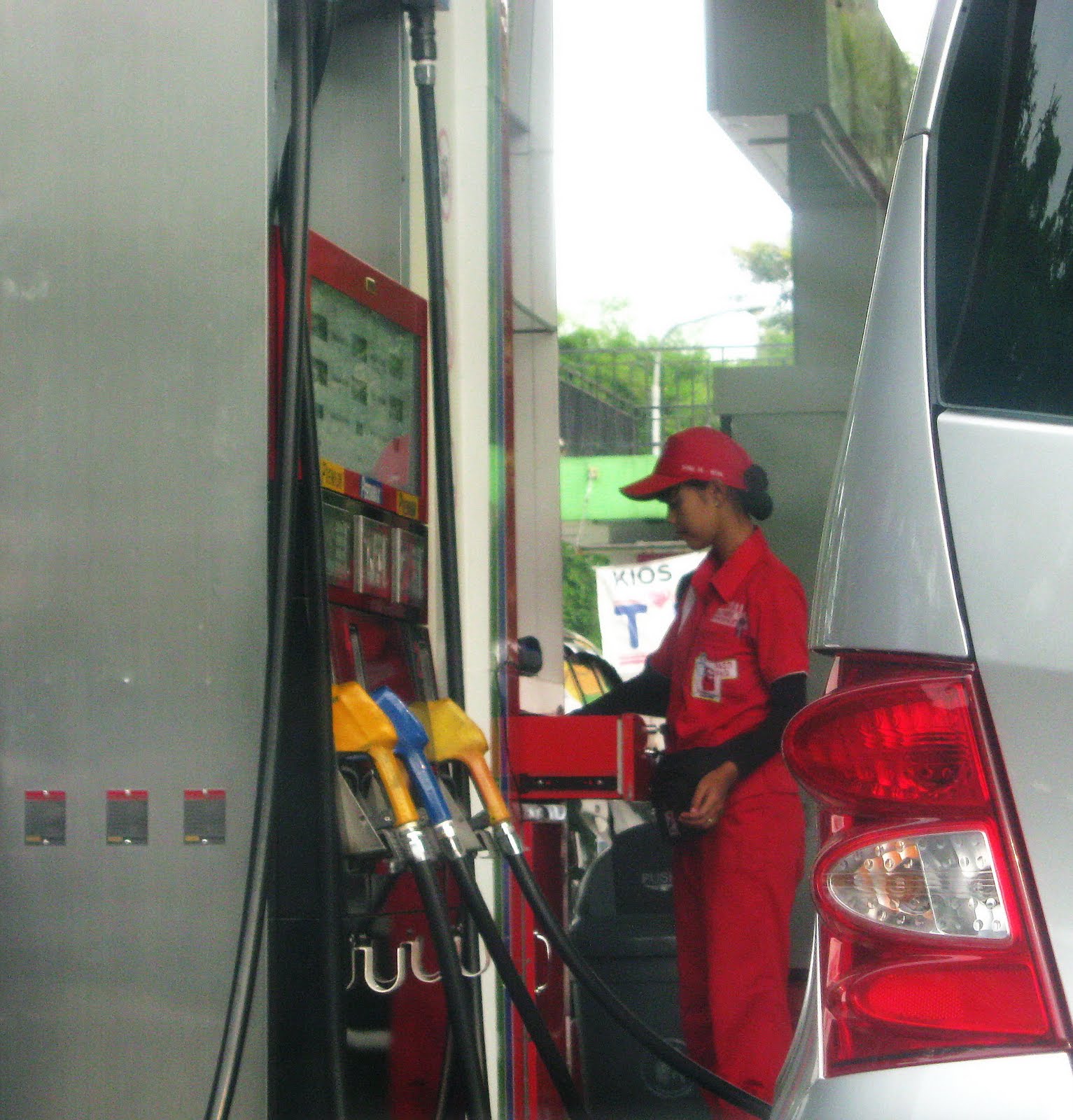 Women at a Gas Station