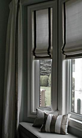 bedroom windows with roman blinds