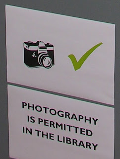 Photogrpahy is allowed in the library sign