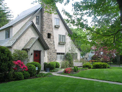 w end front of home from side angle