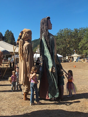 Giant puppets at Hope Mountain Barter Fair Takilma Oregon