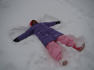 Kid Playing in the Snow