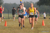 Leaders in the 2A girls race just past the flag at 3200m.