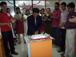 The Guest cutting the cake