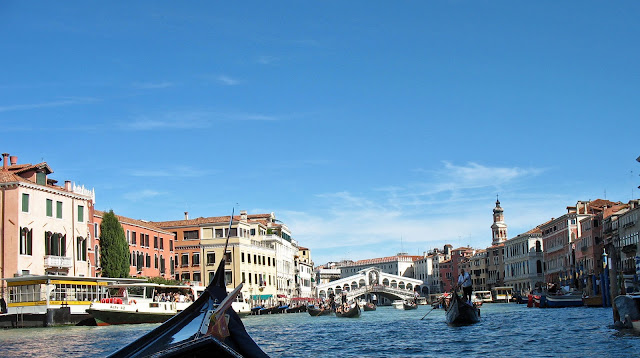 gondola with gondoliers in Venice canal