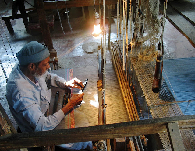 Indian weaver on manual loom